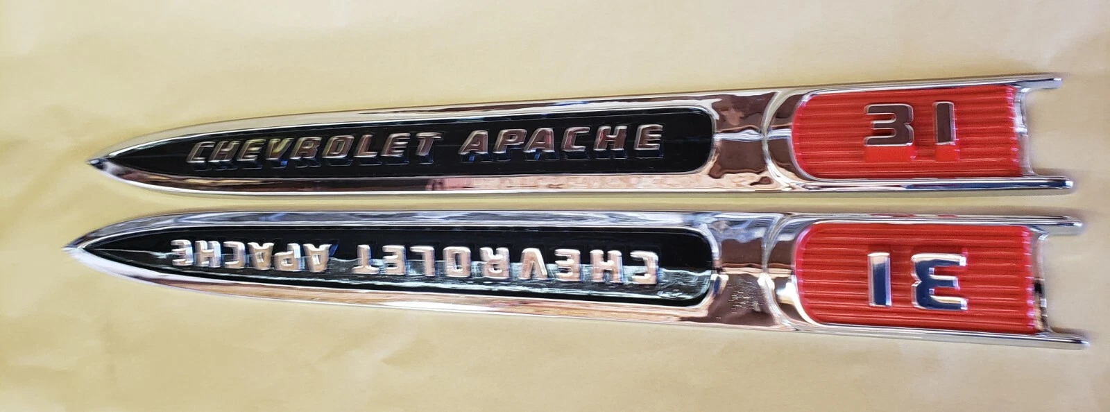 Original Chevrolet Apache fender spear emblems professionally restored and rechromed